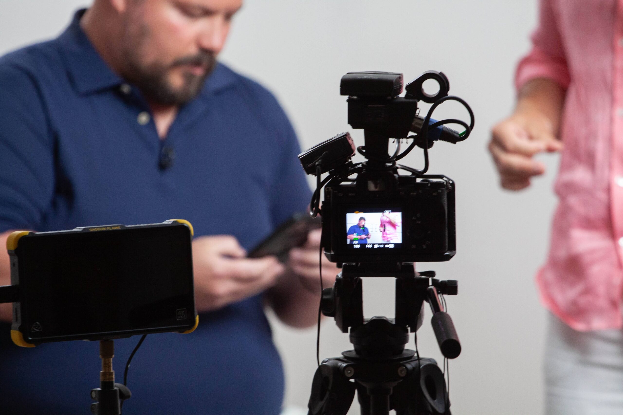 Behind-the-scenes photo from the AAC's Big Idea Series video shoot for the Ratko Vidakovic interview, showing the production monitor and camera setup